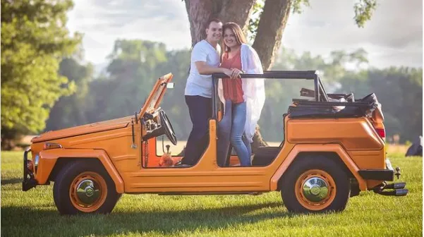 Erin and Kurt with a vintage Volkswagen