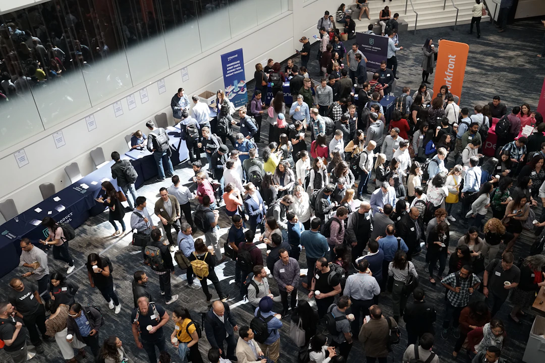 Attendees enjoying a photo booth at an expo