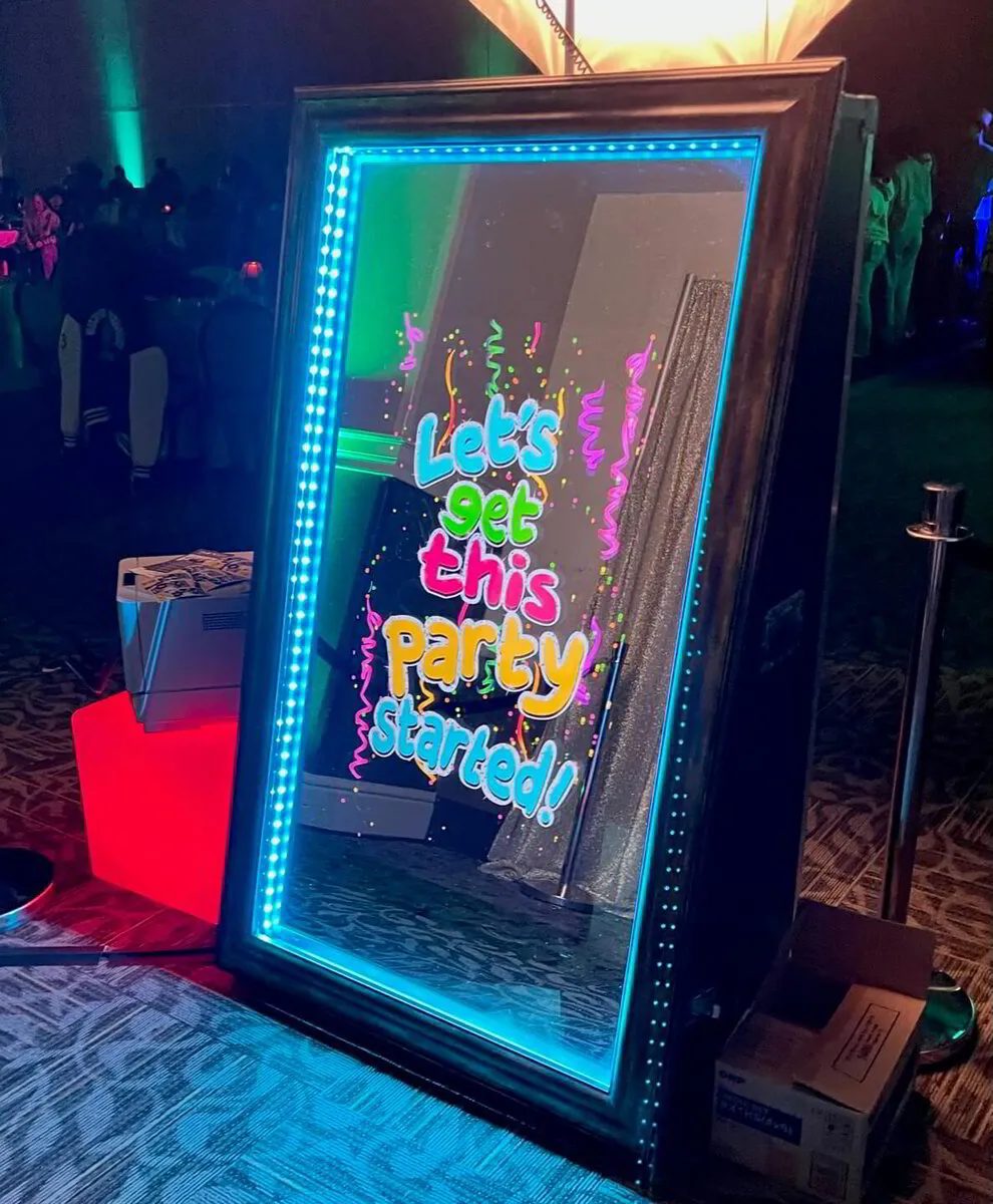 Guests at the mirror booth
